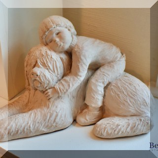 A12. Statue of boy with English sheep dog. Signed Austin Productions “ Bright Eyes”. 9”h x 13”l x 9”d - $48